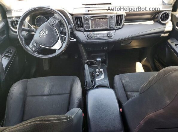 JTMWFREV7GJ075543 2016 TOYOTA RAV4 Gray Dashboard view