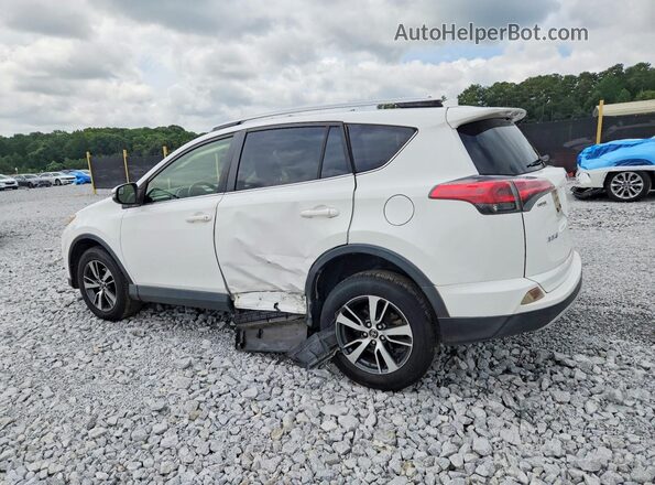 JTMWFREV7GJ076899 2016 TOYOTA RAV4 White Rear left