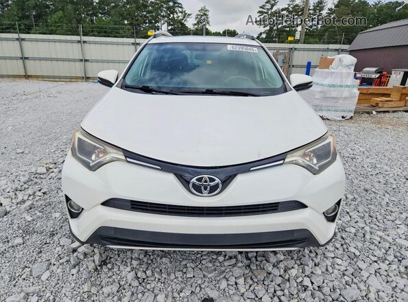 JTMWFREV7GJ076899 2016 TOYOTA RAV4 White Front view