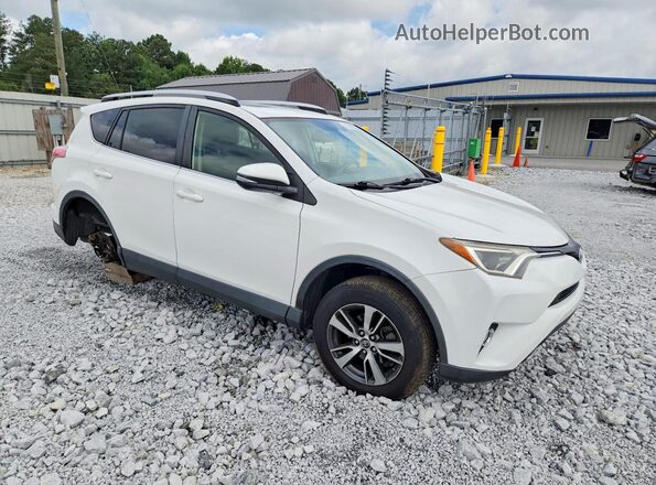 JTMWFREV7GJ076899 2016 TOYOTA RAV4 White Front right