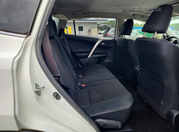 JTMWFREV7GJ076899 2016 TOYOTA RAV4 White Rear seats view