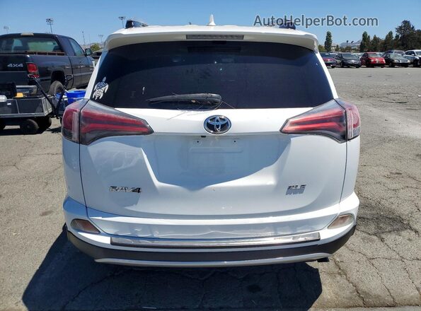 JTMWFREV7GJ084775 2016 TOYOTA RAV4 White Rear view