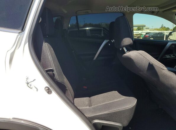 JTMWFREV7GJ084775 2016 TOYOTA RAV4 White Rear interior view