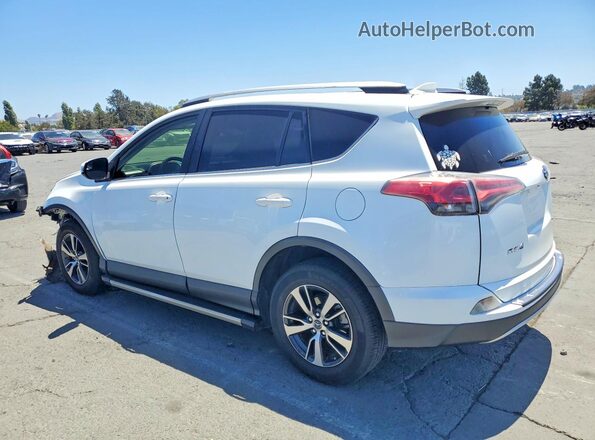 JTMWFREV7GJ084775 2016 TOYOTA RAV4 White Rear left