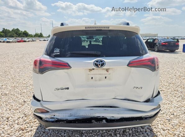 JTMWFREV7HD093041 2017 TOYOTA RAV4 White უკანა ხედი