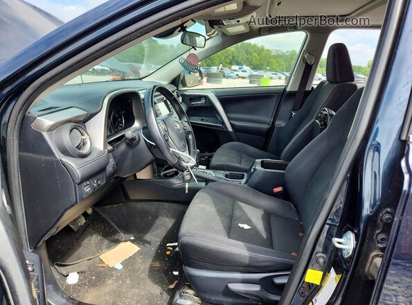 JTMWFREV7HD094559 2017 TOYOTA RAV4 Blue Front interior view