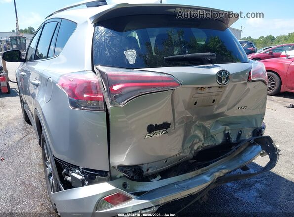 JTMWFREV7JJ186875 2018 TOYOTA RAV4 Silver Դիմացի տեսք