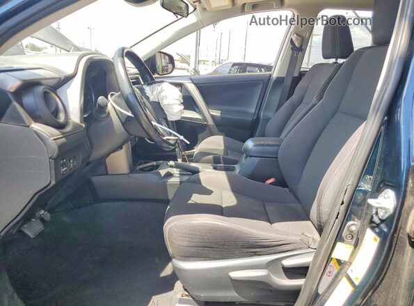 JTMWFREV7JJ188531 2018 TOYOTA RAV4 Blue წინა სალონის ხედი