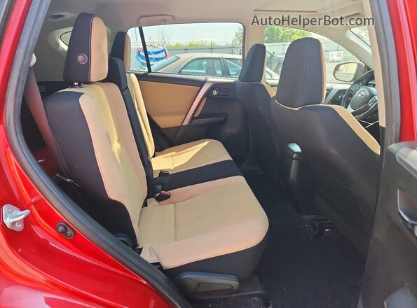 JTMWFREV8GJ061165 2016 TOYOTA RAV4 Red Rear interior view