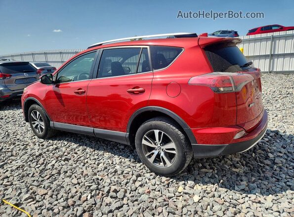 JTMWFREV8GJ061165 2016 TOYOTA RAV4 Red Rear left