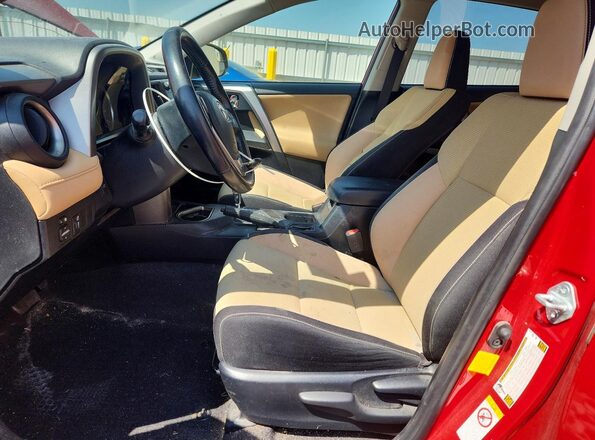 JTMWFREV8GJ061165 2016 TOYOTA RAV4 Red Front interior view