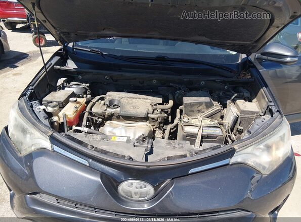 JTMWFREV8HJ132625 2017 TOYOTA RAV4 Серый Вид сзади