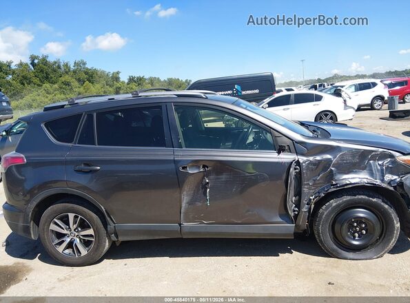 JTMWFREV8HJ132625 2017 TOYOTA RAV4 Серый Вид задней части салона
