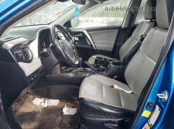 JTMWFREV8HJ707788 2017 TOYOTA RAV4 Blue Widok wnętrza z przodu