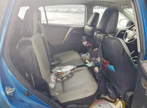 JTMWFREV8HJ707788 2017 TOYOTA RAV4 Blue Widok wnętrza z tyłu