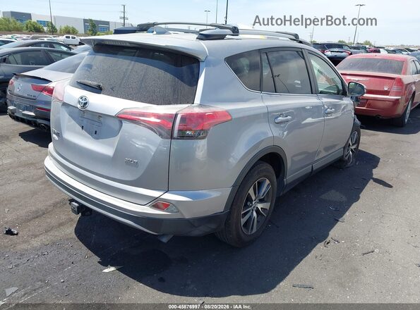 JTMWFREV8JD120642 2018 TOYOTA RAV4 Silver Задня права чверть