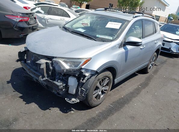JTMWFREV8JD120642 2018 TOYOTA RAV4 Silver Передня ліва чверть
