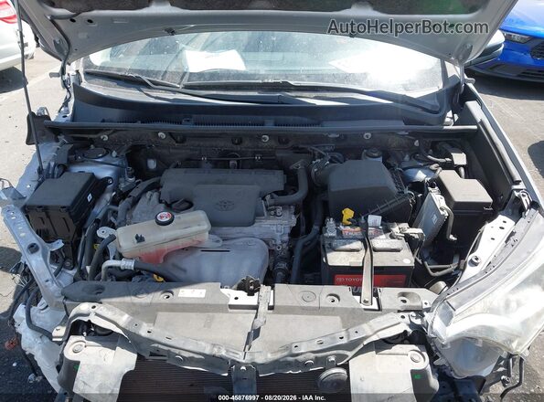 JTMWFREV8JD120642 2018 TOYOTA RAV4 Silver Вид ззаду