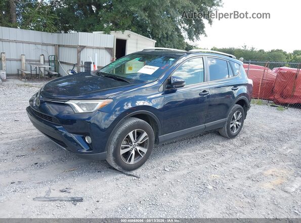JTMWFREV8JJ169437 2018 TOYOTA RAV4 Blue Przód lewy
