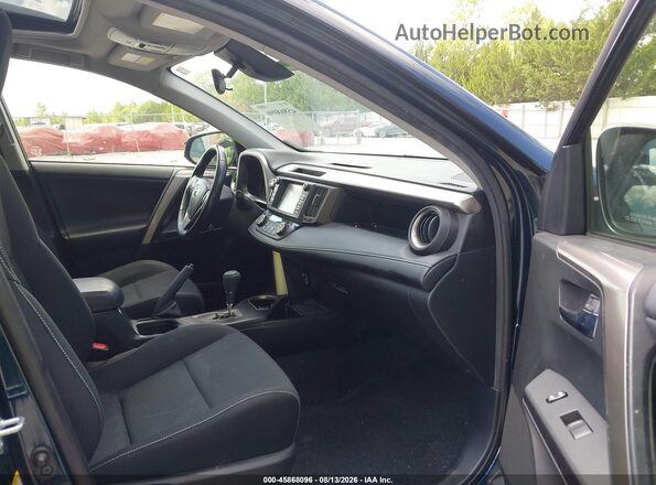 JTMWFREV8JJ169437 2018 TOYOTA RAV4 Blue Widok wnętrza z przodu