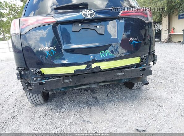 JTMWFREV8JJ169437 2018 TOYOTA RAV4 Blue Widok z przodu