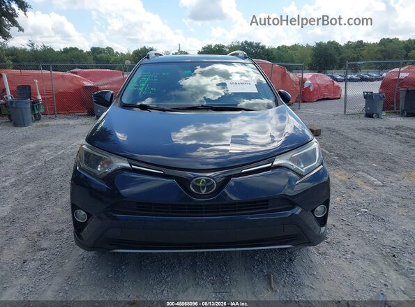 JTMWFREV8JJ169437 2018 TOYOTA RAV4 Blue Widok zestawu wskaźników