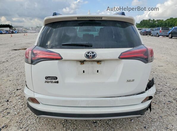 JTMWFREVXGD090018 2016 TOYOTA RAV4 White Vista trasera