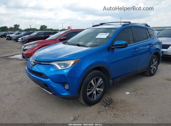 JTMWFREVXGJ060650 2016 TOYOTA RAV4 Blue Vista tres cuartos delantera izquierda