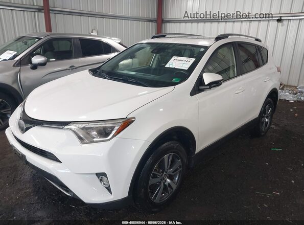 JTMWFREVXHJ714080 2017 TOYOTA RAV4 White Front left
