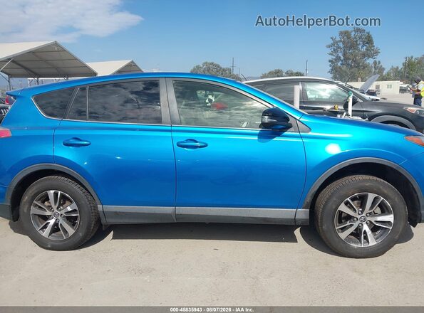 JTMWFREVXHJ718260 2017 TOYOTA RAV4 Blue Vista interior trasera