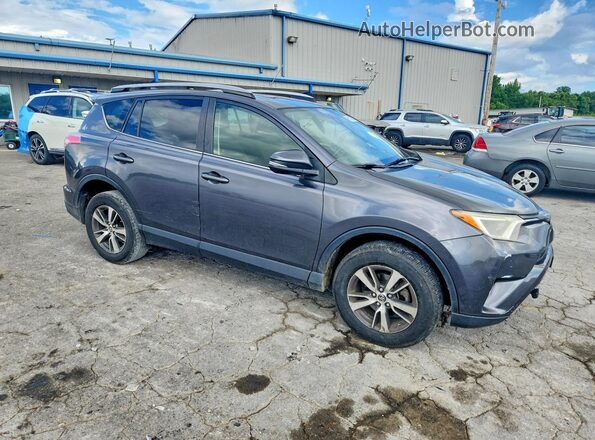 JTMWFREVXJJ730043 2018 TOYOTA RAV4 Gray Front right