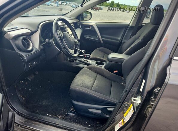 JTMWFREVXJJ730043 2018 TOYOTA RAV4 Gray Front interior view