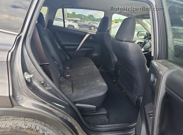 JTMWFREVXJJ730043 2018 TOYOTA RAV4 Gray Rear interior view
