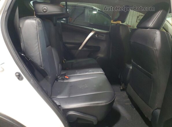 JTMYFREV4GJ069840 2016 TOYOTA RAV4 White Սալոնի հետևի տեսք