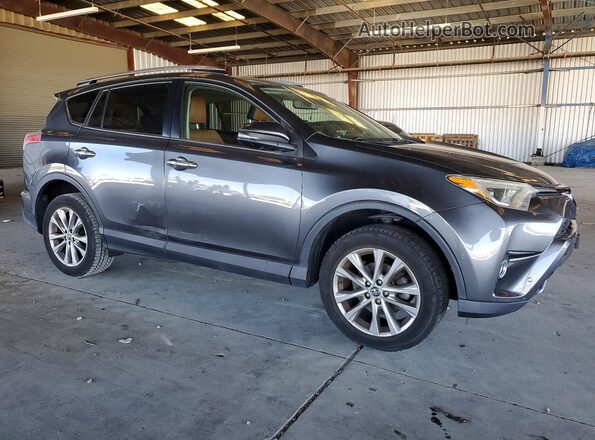 JTMYFREV6HD095128 2017 TOYOTA RAV4 Gray Front right