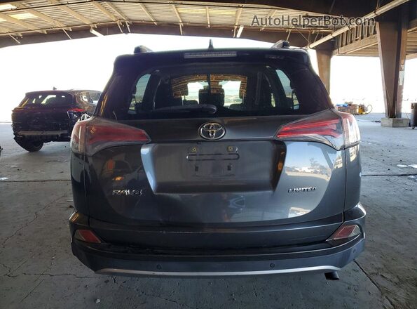 JTMYFREV6HD095128 2017 TOYOTA RAV4 Gray Rear view
