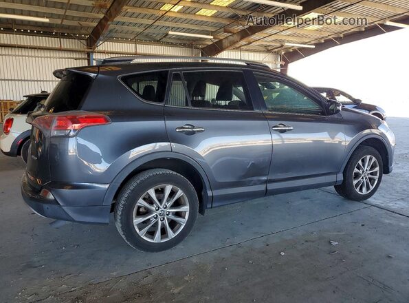 JTMYFREV6HD095128 2017 TOYOTA RAV4 Gray Rear right