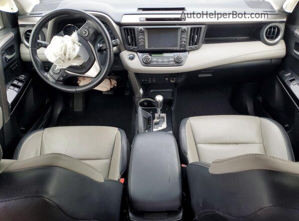 JTMYFREV8GJ062051 2016 TOYOTA RAV4 Gray Dashboard view