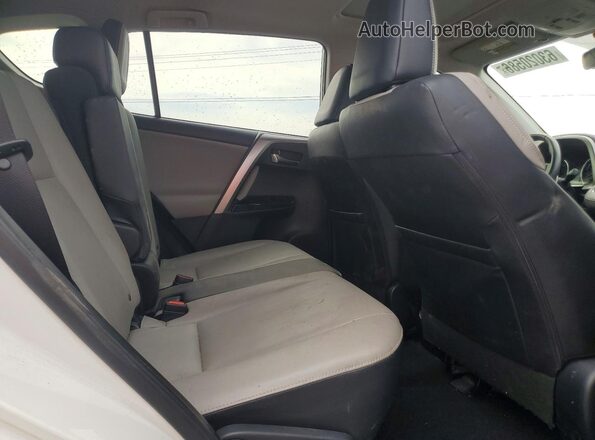 JTMYFREV8GJ068626 2016 TOYOTA RAV4 White Սալոնի հետևի տեսք
