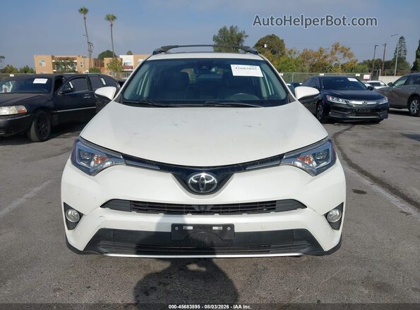 JTMYFREV9GJ077934 2016 TOYOTA RAV4 Белый Вид щитка приборов