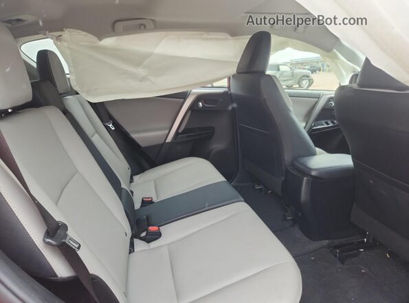 JTMYFREVXHJ132831 2017 TOYOTA RAV4 Red უკანა სალონის ხედი
