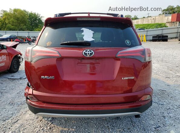 JTMYFREVXJD128587 2018 TOYOTA RAV4 Burgundy Vista trasera