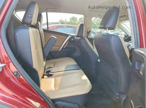 JTMYFREVXJD128587 2018 TOYOTA RAV4 Burgundy Vista interior trasera