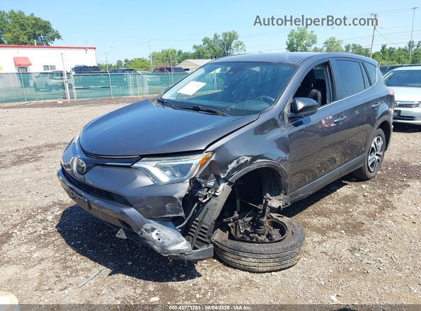 JTMZFREV0HJ142434 2017 TOYOTA RAV4 Gray Vista del salpicadero