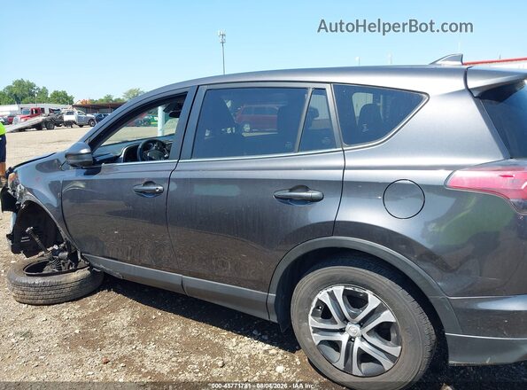 JTMZFREV0HJ142434 2017 TOYOTA RAV4 Gray Vista interior trasera