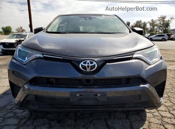 JTMZFREV0JJ742540 2018 TOYOTA RAV4 Gray Front view