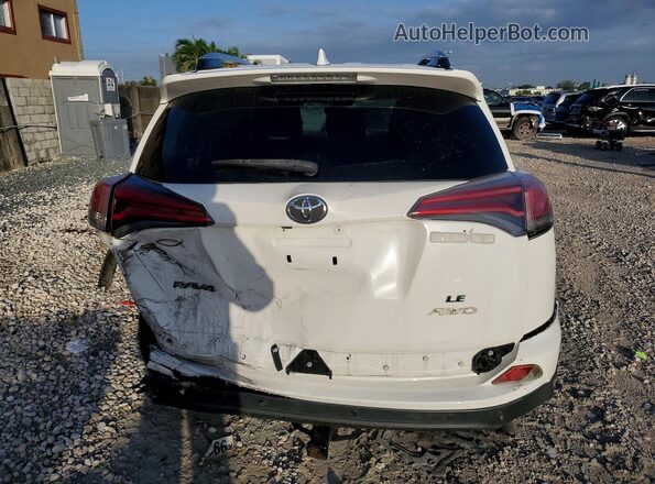 JTMZFREV1GD090972 2016 TOYOTA RAV4 White Rear view