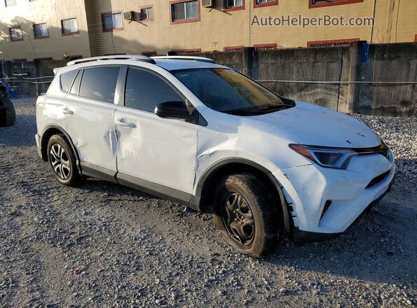 JTMZFREV1GD090972 2016 TOYOTA RAV4 White Front right
