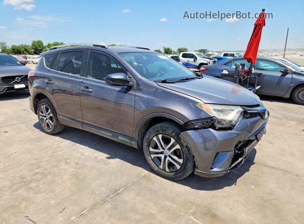 JTMZFREV1GJ077592 2016 TOYOTA RAV4 Gray Front right