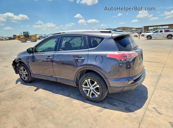 JTMZFREV1GJ077592 2016 TOYOTA RAV4 Gray Rear left